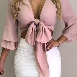 Pink bow top with long puffed sleeves and large front bow