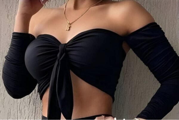 Black bow top with long sleeves and exposed shoulders