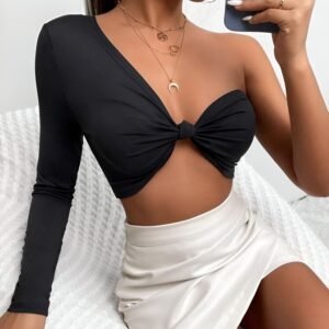 Black one-shoulder top with long sleeve, large neckline, and accent strap