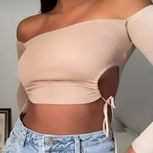 Pale pink long sleeve crop top with open shoulders and side slit