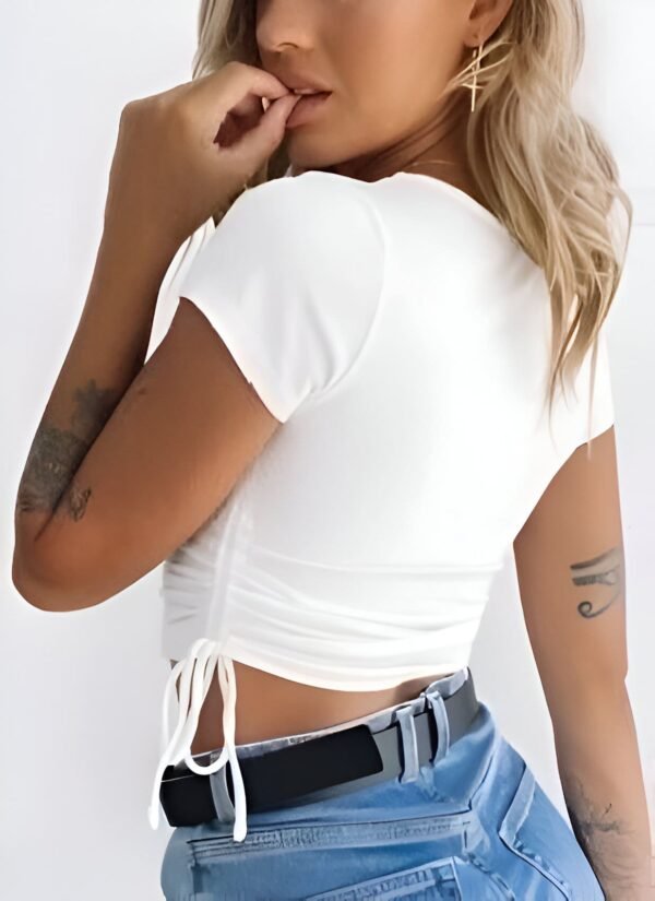 White short sleeve crop top with high neck and side ties for adjustable length