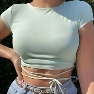 Light grayish-green short sleeve crop top with deep neckline and vertical front straps