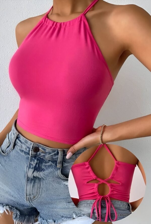 Fuchsia sleeveless crop top with high neck and adjustable back straps