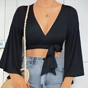 Black wrap top with long sleeves and a pronounced neckline