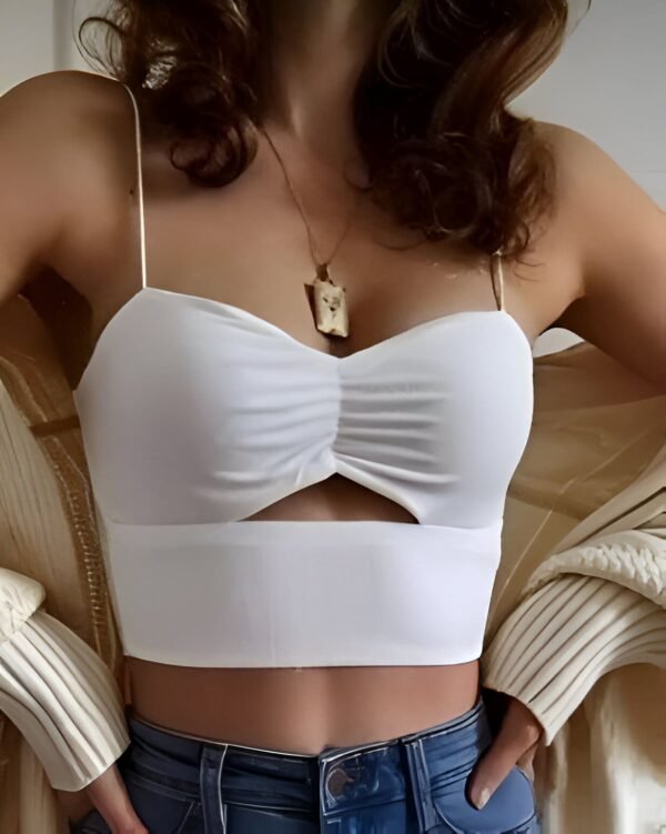 White spaghetti strap crop top with a small front slit and a simple design