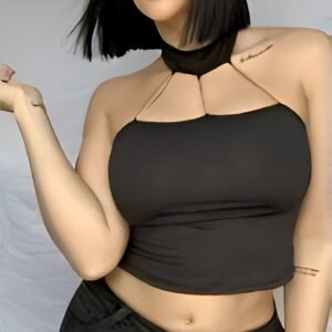 Black spaghetti strap crop top with three thin straps connecting to a turtleneck and a deep neckline