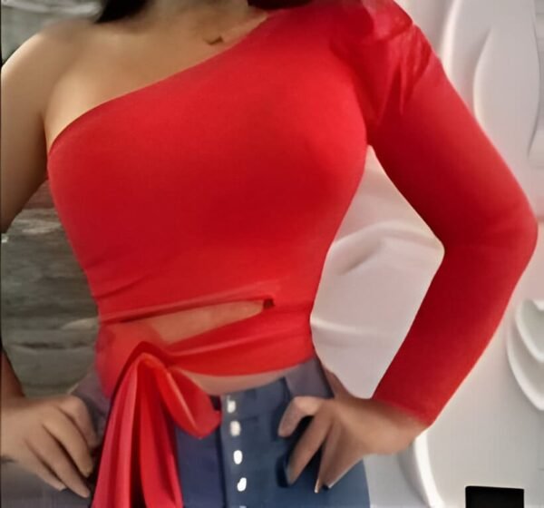 Red one-shoulder top with long puffed sleeve and adjustable side opening