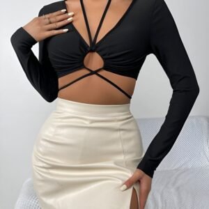 Black Keyhole Top with long sleeves, pronounced neckline, and round cutout with crisscross tie detail - Fitted crop top for casual outings, parties, and dates.