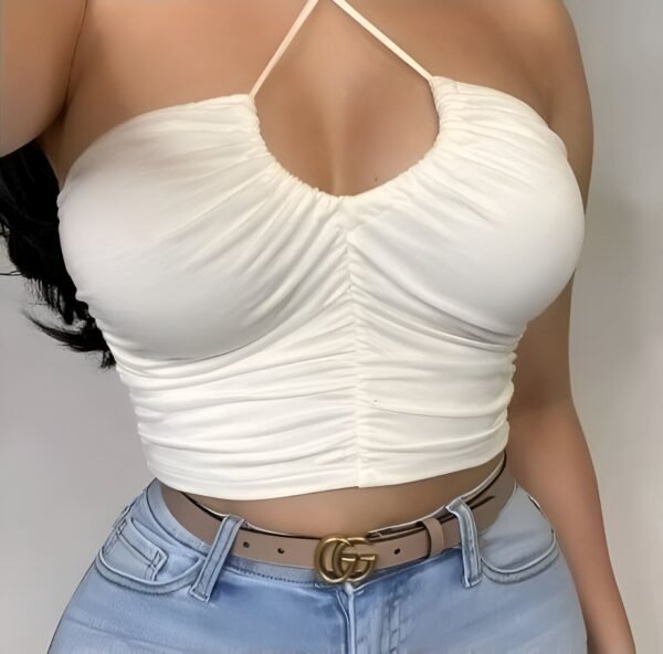 White halter top with slight deep neckline and crisscross neck straps