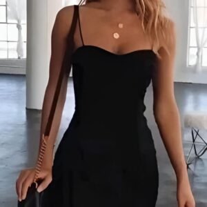 Black mini dress with deep neckline and thin straps