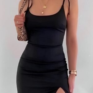 Black mini dress with thin straps and side slit