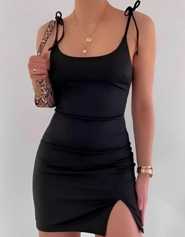 Black mini dress with thin straps and side slit