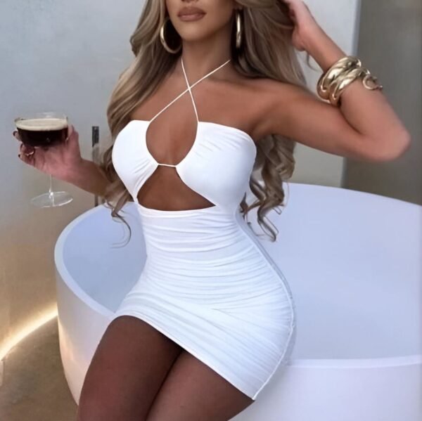 White halter mini dress with crisscross straps and a large cutout under the chest