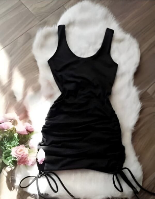 Black tank mini dress with thick straps and adjustable sides